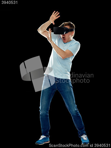 Image of  man in virtual reality headset or 3d glasses