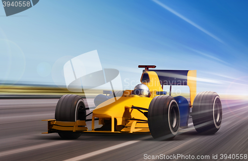 Image of yellow race car
