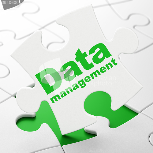 Image of Information concept: Data Management on puzzle background