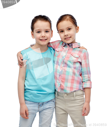 Image of happy smiling little girls hugging