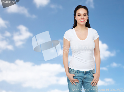 Image of happy young woman or teenage girl in white t-shirt
