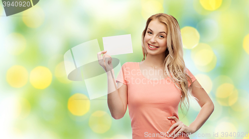 Image of happy woman or teen girl with blank white paper