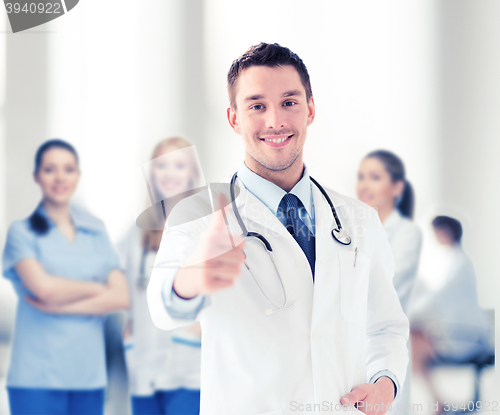 Image of doctor with stethoscope showing thumbs up