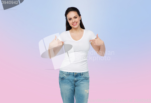 Image of happy young woman or teenage girl in white t-shirt