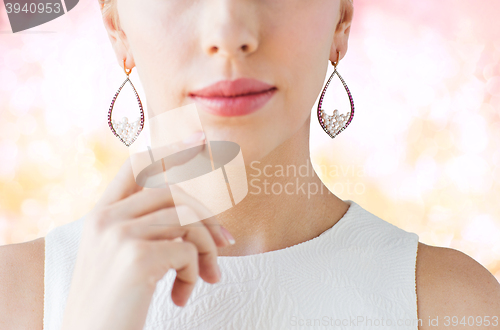 Image of close up of beautiful woman face with earrings