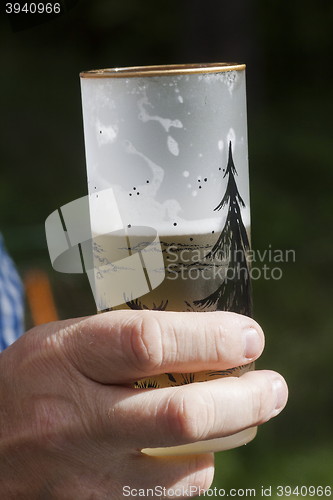 Image of beer in hand