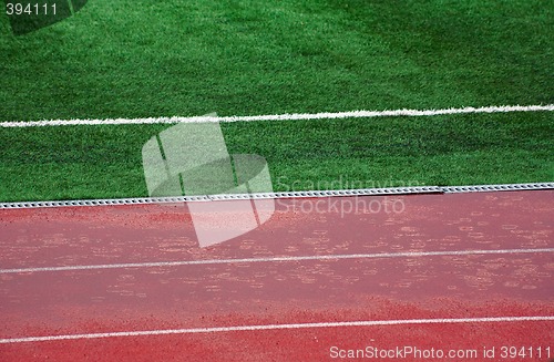 Image of Football field. Rain