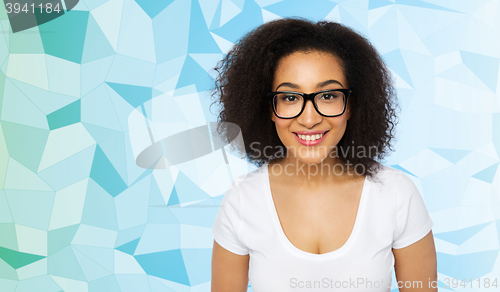 Image of happy african woman or student girl in eyeglasses