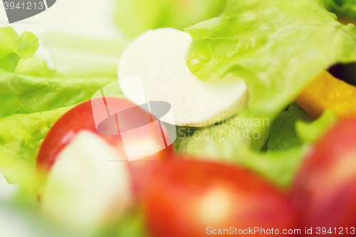 Image of close up of vegetable salad with mozzarella cheese