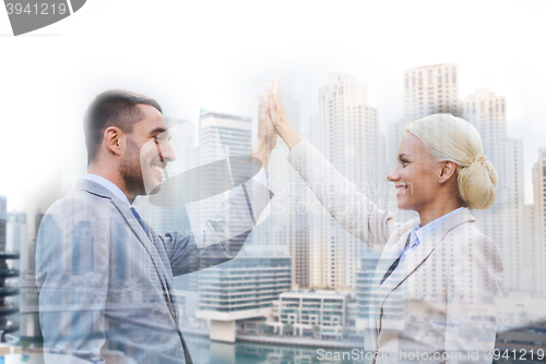 Image of smiling businessmen outdoors