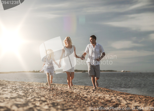 Image of happy family at the seaside