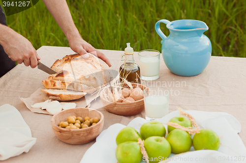Image of The healthy natural food in the field. Family dinner