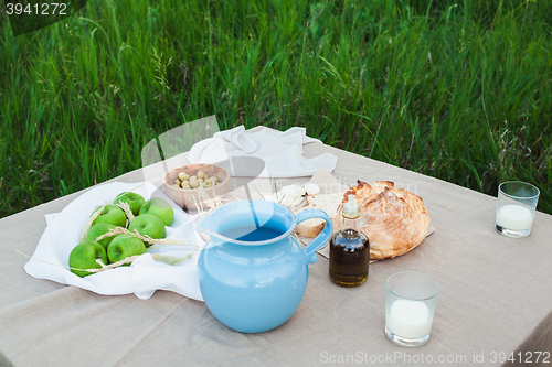 Image of The healthy natural food in the field. Family dinner