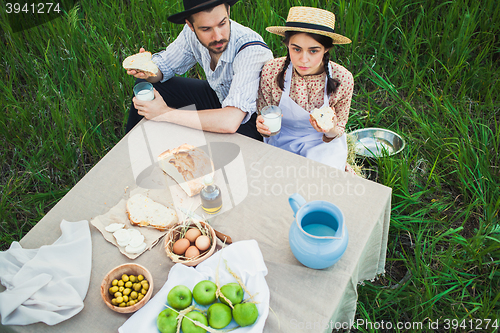 Image of The healthy natural food in the field. Family dinner