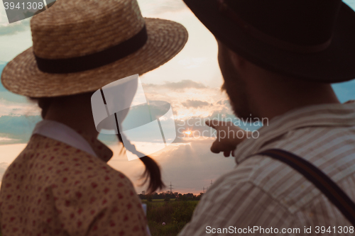 Image of Young couple in love in the meadow