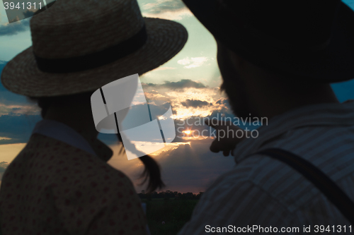 Image of Young couple in love in the meadow