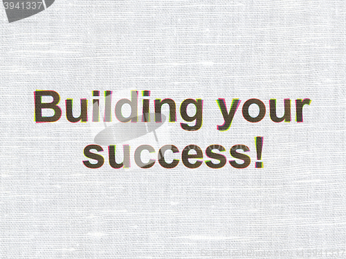 Image of Business concept: Building your Success! on fabric texture background