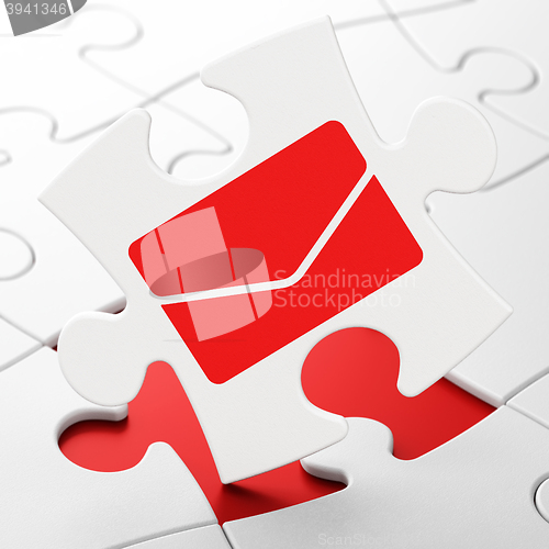 Image of Business concept: Email on puzzle background