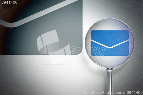 Image of Finance concept:  Email with optical glass on digital background
