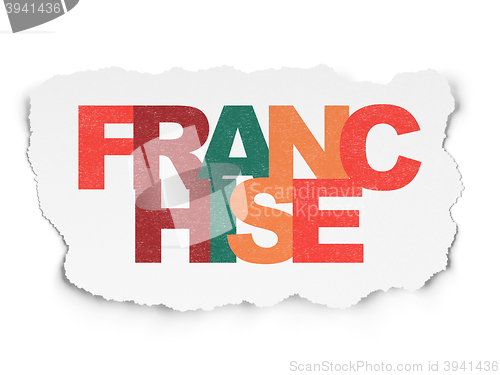 Image of Finance concept: Franchise on Torn Paper background