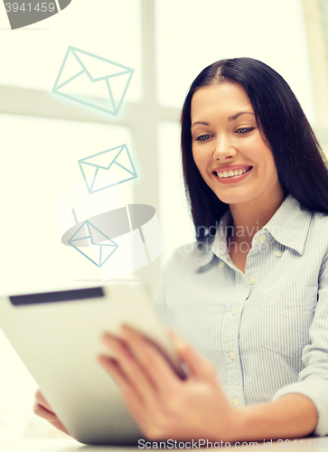 Image of smiling businesswoman or student with tablet pc