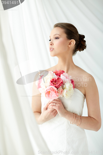 Image of beautiful asian woman with flower and jewelry