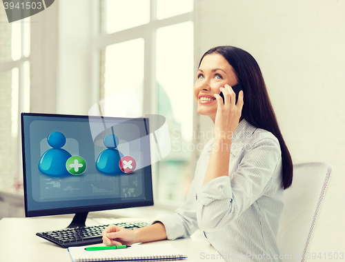 Image of smiling businesswoman or student with smartphone