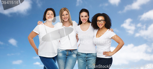 Image of group of happy different women in white t-shirts