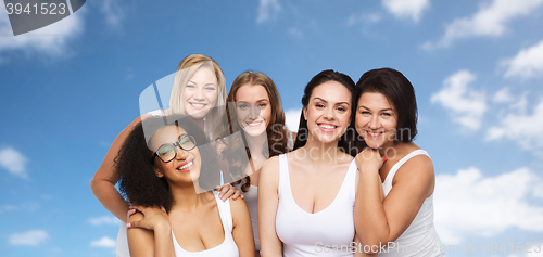 Image of group of happy different women in white underwear