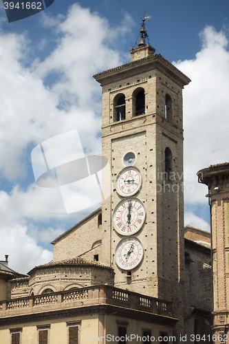 Image of three clocks at the church tower of Tolentino