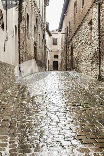 Image of typical italian city street at rain