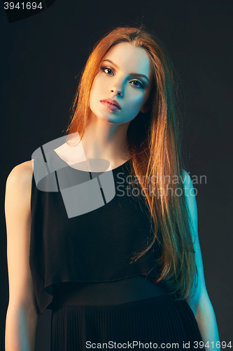 Image of Fashion portrait of beautiful red haired girl