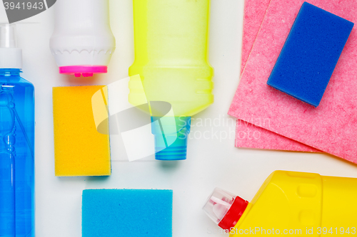 Image of House cleaning products on white table