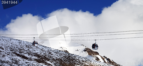 Image of Panoramic view on gondola lifts at evening