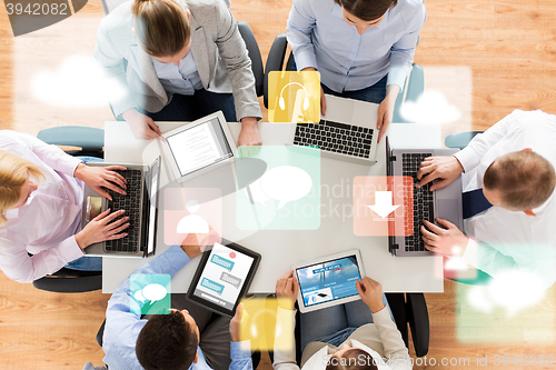 Image of business team with laptop and tablet pc computers