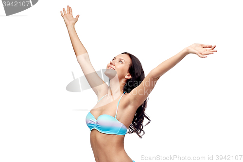 Image of happy woman in bikini swimsuit with raised hands