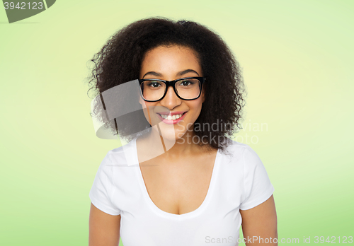 Image of happy african woman or student girl in eyeglasses