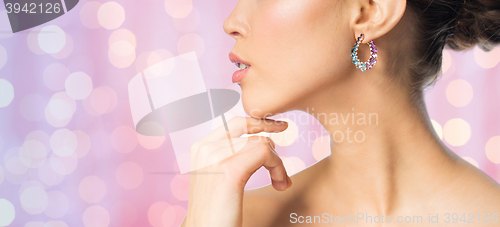 Image of close up of beautiful woman face with earring