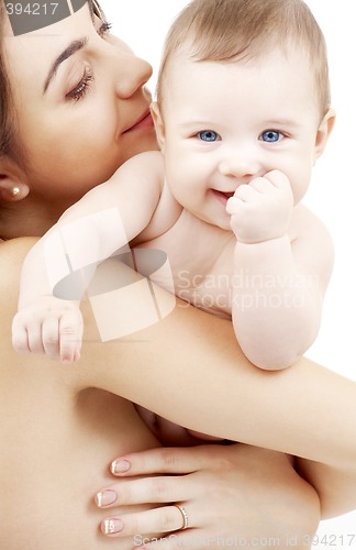 Image of clean happy baby in mother hands