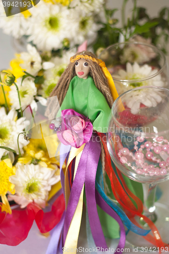 Image of hand made doll of summer