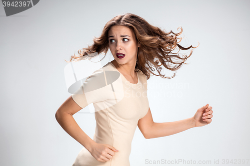 Image of The young woman\'s portrait with frightened emotions