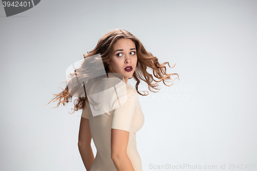 Image of The young woman\'s portrait with frightened emotions