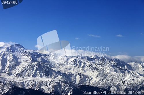 Image of View on snowy mountains at nice sunny day