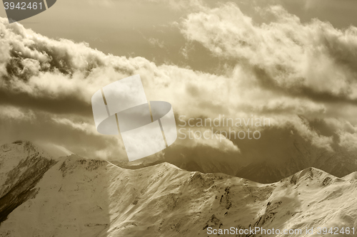 Image of Evening mountains and cloudy sky