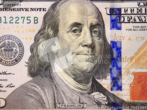 Image of hundred dollar bank note with image of president