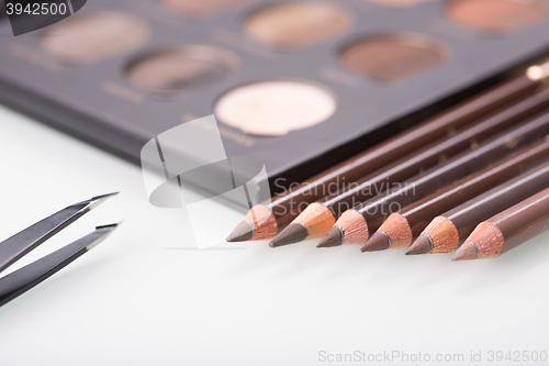 Image of shadows eye and eyebrow set on table