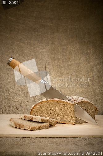 Image of A slice of bread with butter 