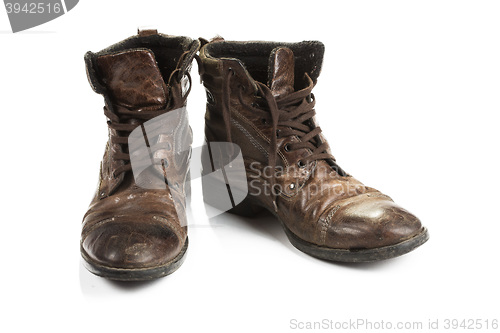 Image of Dirty old boots isolated. white background