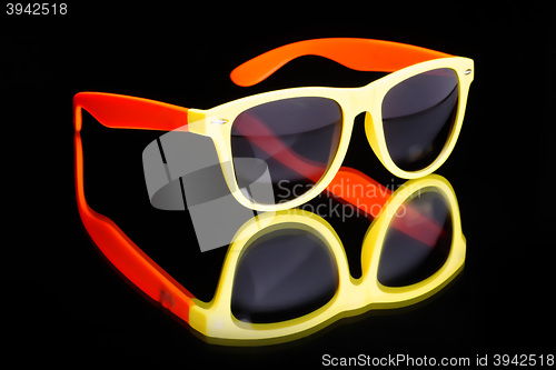 Image of colored sunglasses.