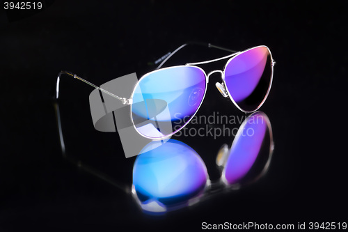 Image of colored sunglasses.